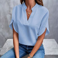 Blusa con cuello en V y drapeado